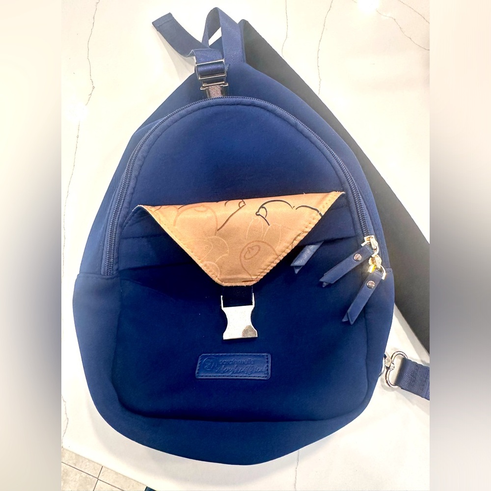 Sarah wells sling bag boob print